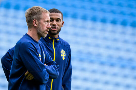 Head coach Graham Potter and Isak Hien of the Swedish