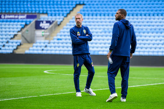 Head coach Graham Potter and Isak Hien of the Swedish
