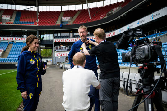 Press officer Petra Thorén and head coach Graham Potter of