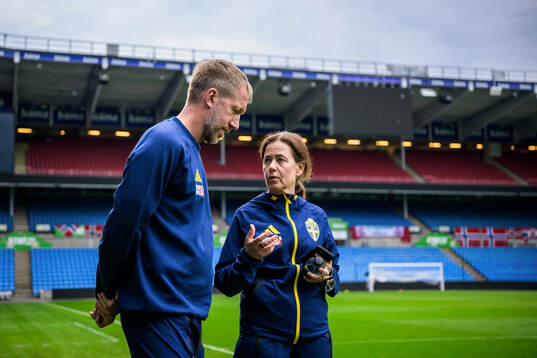 Head coach Graham Potter and press officer Petra Thorén of