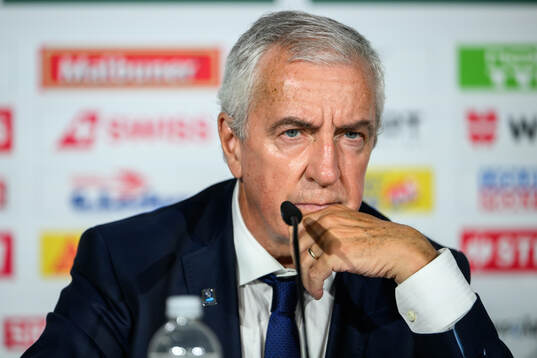 IIHF President Luc Tardif at an end-of-tournament press