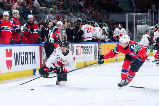Porter Martone of Canada and Martin Rønnild of Norway