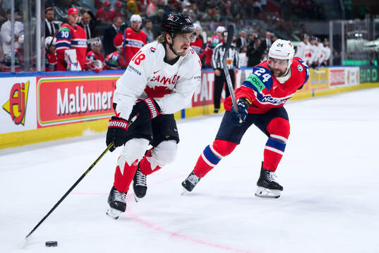 Dawson Mercer of Canada and Jacob Berglund of Norway