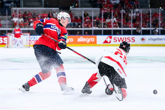 Tinus Luc Koblar of Norway and Darnell Nurse of Canada