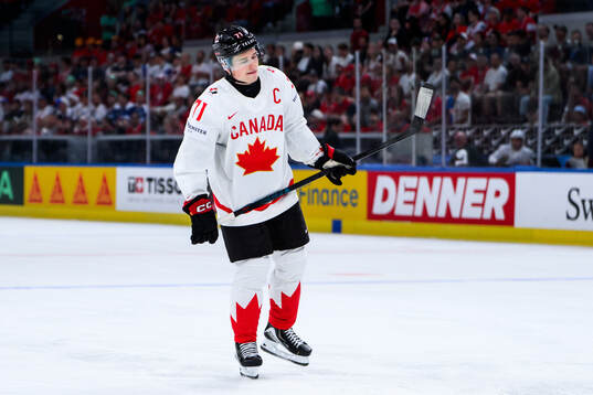 Macklin Celebrini of Canada looks dejected