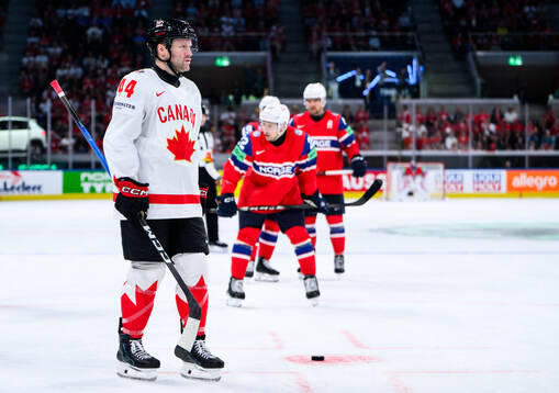 Morgan Rielly of Canada looks dejected