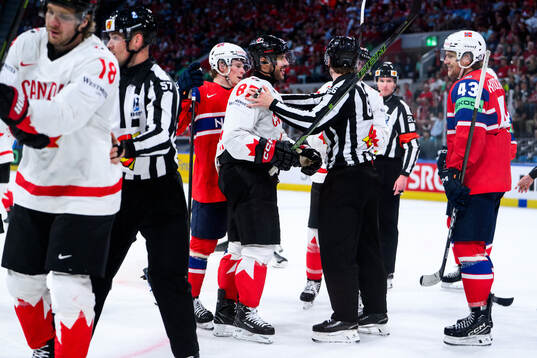 Sidney Crosby of Canada and Max Krogdahl of Norway