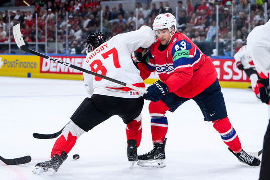 Sidney Crosby of Canada and Max Krogdahl of Norway