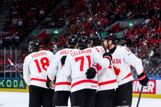 Robert Thomas of Canada celebrates