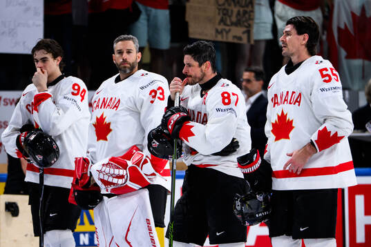 Sidney Crosby of Canada looks dejected