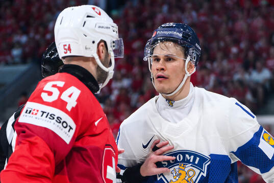 Christian Marti of Switzerland and Jesse Puljujärvi of