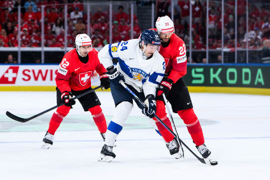 Hannes Björninen of Finland and Nino Niederreiter of