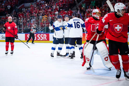 Anton Lundell of Finland celebrates scoring 0-1 (later
