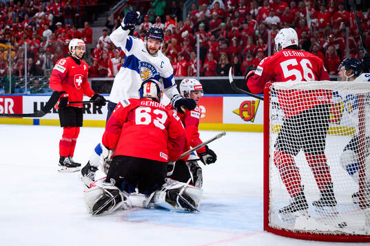 Alexander Barkov of Finland celebrates scoring 0-1 (later