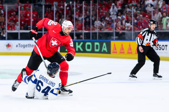 Nino Niederreiter of Switzerland and Mikael Granlund of