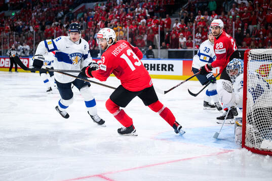 Olli Määtä of Finland and Nico Hischier of Switzerland