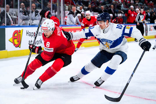 Simon Knak of Switzerland and Henri Jokiharju of Finland
