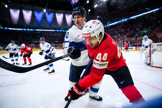 Henri Jokiharju of Finland and Pius Suter of Switzerland