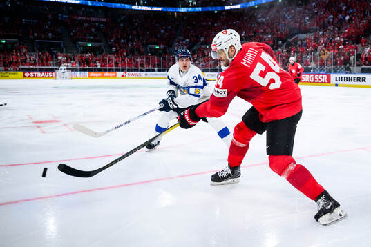 Aatu Räty of Finland and Christian Marti of Switzerland