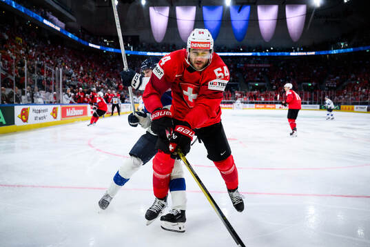 Aatu Räty of Finland and Christian Marti of Switzerland