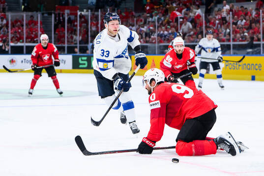 Nikolas Matinpalo of Finland and Roman Josi of Switzerland