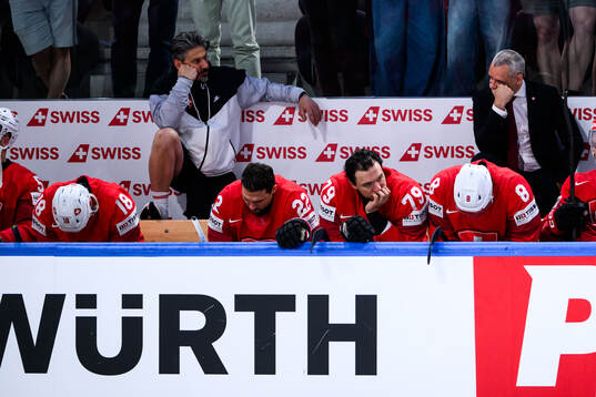 Head coach Jan Cadieux of Switzerland looks dejected