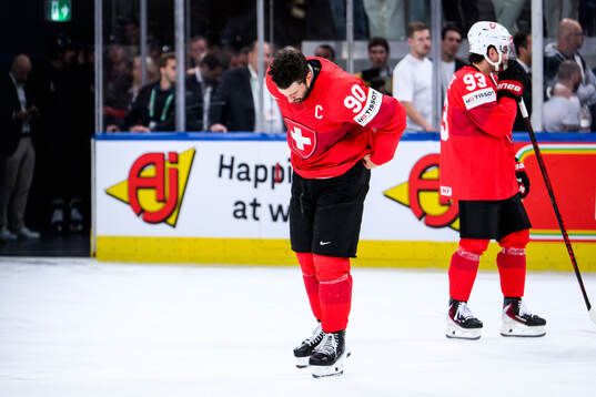 Roman Josi of Switzerland looks dejected