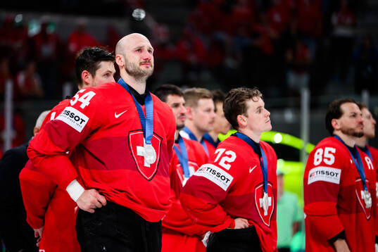Christian Marti of Switzerland looks dejected and cries