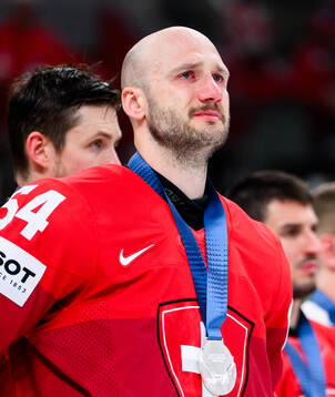 Christian Marti of Switzerland looks dejected and cries