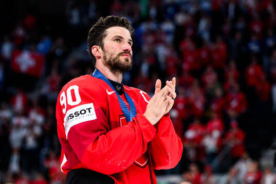 Roman Josi of Switzerland looks dejected