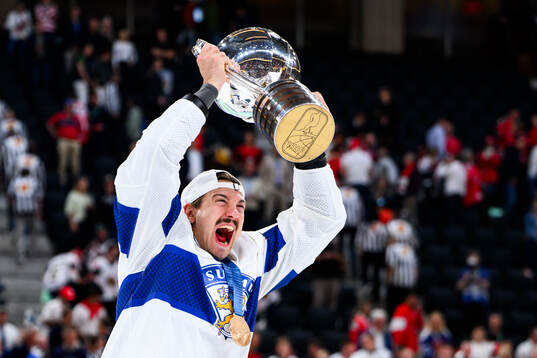 Hannes Björninen of Finland celebrates with the trophy