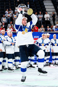 Mikko Lehtonen of Finland celebrates with the trophy