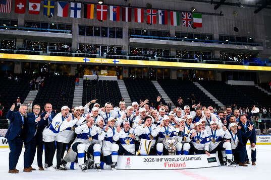 Players of Finland celebrate with the trophy