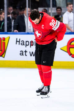 Roman Josi of Switzerland looks dejected