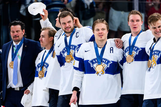 Alexander Barkov and Mikael Granlund of Finland