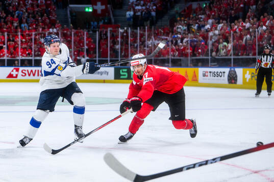 Konsta Helenius of Finland scores the game winning goal