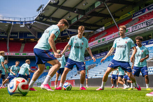 Henrik Falchener and Kristoffer Ajer of the Norwegian