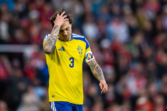 Victor Nilsson Lindelöf of Sweden looks dejected