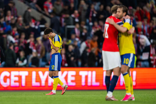 Besfort Zeneli of Sweden looks dejected