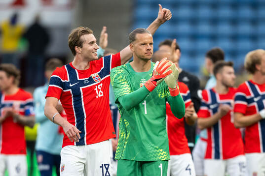 Kristian Thorstvedt and goalkeeper Ørjan Nyland of Norway