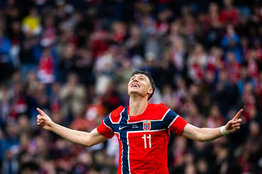 Jørgen Strand Larsen of Norway celebrates