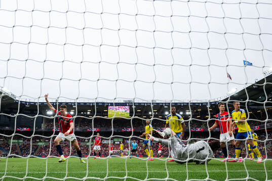 Jørgen Strand Larsen of Norway celebrates