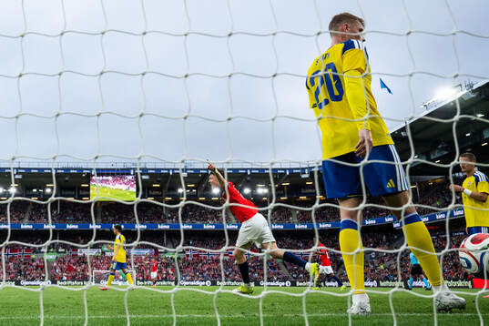 Jørgen Strand Larsen of Norway celebrates