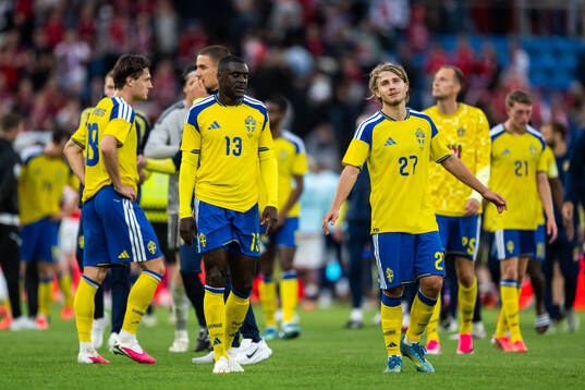 Ken Sema and Sebastian Nanasi of Sweden look dejected