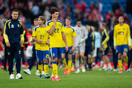 Besfort Zeneli of Sweden looks dejected