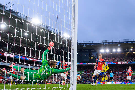 Goalkeeper Ørjan Nyland of Norway reaches for the ball in