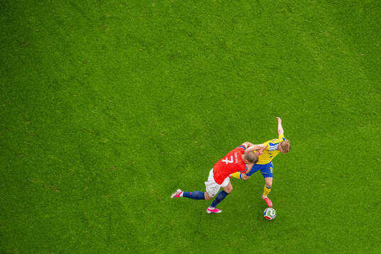 Alexander Sørloth of Norway and Daniel Svensson of Sweden