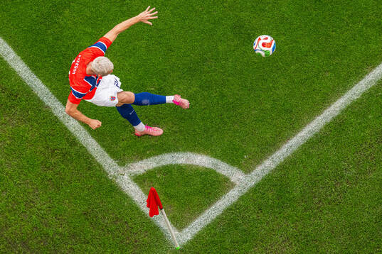 Julian Ryerson of Norway takes a corner kick