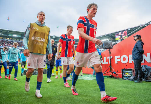 Leo Østigård and Sander Berge of Norway at half-time