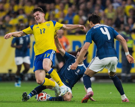Viktor Gyökeres of Sweden and Panagiotis Retsos of Greece